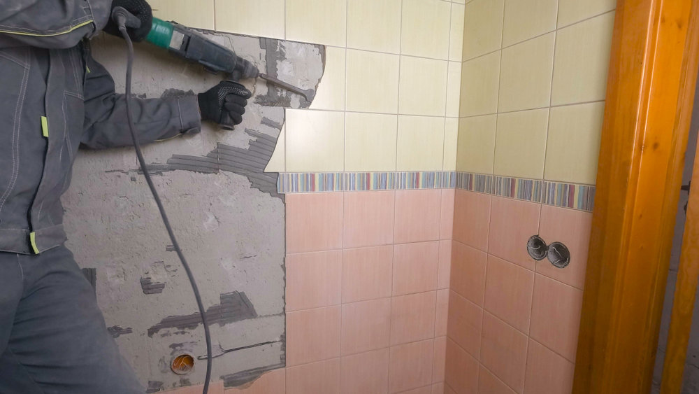 how to repair bathroom tile wall