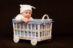 baby in wheel box